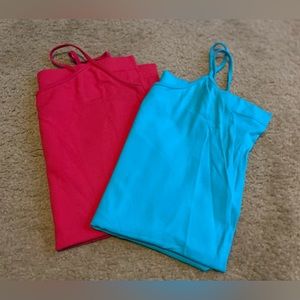 Maurice’s woman’s tank tops. 1- Fuchsia 1- turquoise. Size S/M